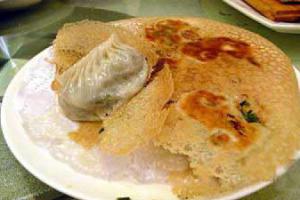 鸡汁锅贴（重庆“丘二馆”于40年代创制的著名小吃）